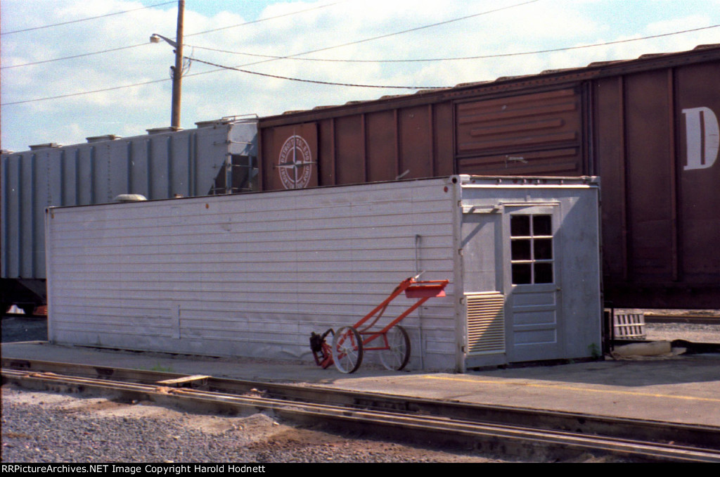 Old container repurposed into storage building